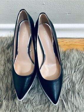 BCBGeneration Black Pointed Toe Pumps with Silver Accent